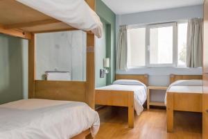 Postel nebo postele na pokoji v ubytování Circus Hostel