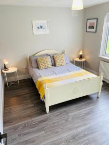 Voodi või voodid majutusasutuse Bay Area House, Spiddal toas