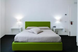 Postel nebo postele na pokoji v ubytování Vittoria Design Hotel di Luce Hotels