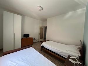 Postel nebo postele na pokoji v ubytování Casa Francesca