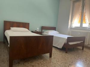 Postel nebo postele na pokoji v ubytování Casa Francesca