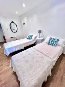 Ένα ή περισσότερα κρεβάτια σε δωμάτιο στο Villa María