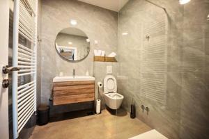 Koupelna v ubytování Apartman Oleandar + 14 fotografií