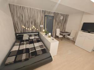 Ένα ή περισσότερα κρεβάτια σε δωμάτιο στο Appartment Mühlberg Obermühle