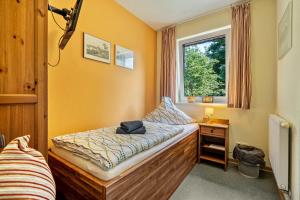 Postel nebo postele na pokoji v ubytování Gästezimmer - Meißen