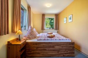 Postel nebo postele na pokoji v ubytování Gästezimmer - Meißen
