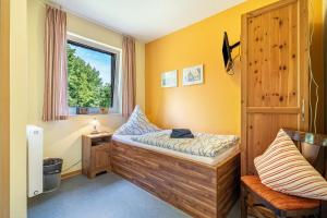 Postel nebo postele na pokoji v ubytování Gästezimmer - Meißen