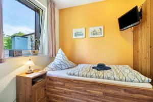 Postel nebo postele na pokoji v ubytování Gästezimmer - Meißen