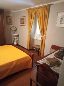 Posteľ alebo postele v izbe v ubytovaní B&B IL TERRAZZO