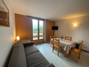 Posezení v ubytování travelski home classic - Les Chalets de la Fontaine du Roi