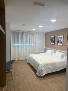 Cama o camas de una habitación en La Hospedería - El Provencio