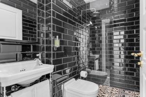 Koupelna v ubytování Hotel Aska