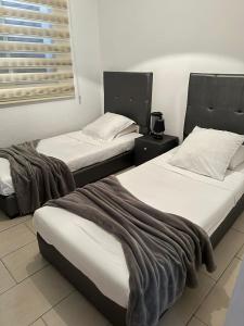 Ένα ή περισσότερα κρεβάτια σε δωμάτιο στο Luxury appartement
