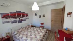 Postel nebo postele na pokoji v ubytování La Dimora Dei Due Laghi