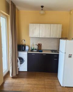 Kuchyň nebo kuchyňský kout v ubytování Horizont Apartments 8
