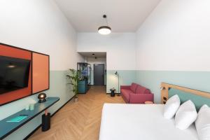 Ein Bett oder Betten in einem Zimmer der Unterkunft CX Milan Bicocca