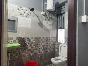 Koupelna v ubytování Aama Home Stay