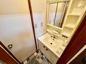 Koupelna v ubytování Apartment Hotel 下野