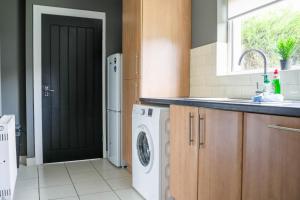 Kuchyň nebo kuchyňský kout v ubytování Andrew House