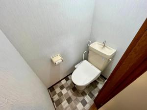 Koupelna v ubytování Apartment Hotel 下野