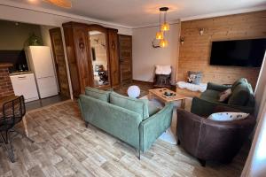 Kuchyňa alebo kuchynka v ubytovaní La Dorbluche duplex apartment 10-11 person