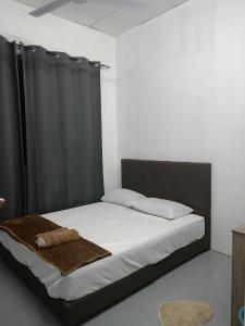 Postel nebo postele na pokoji v ubytování KG Motel