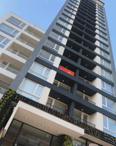 Το κτήριο όπου στεγάζεται  το διαμέρισμα +18 φωτογραφίες