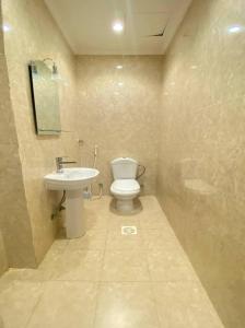 Koupelna v ubytování Al tawfeeg hotel - Al Azizyah