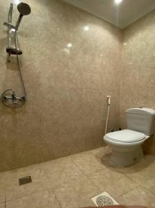 Koupelna v ubytování Al tawfeeg hotel - Al Azizyah