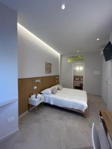 Postel nebo postele na pokoji v ubytování Light&Sand Affittacamere