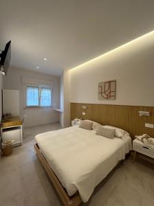 Postel nebo postele na pokoji v ubytování Light&Sand Affittacamere