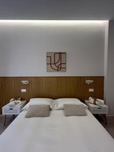 Postel nebo postele na pokoji v ubytování Light&Sand Affittacamere