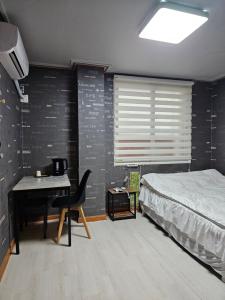 Postel nebo postele na pokoji v ubytování Mirim Motel + 10 fotografií