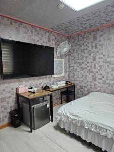 Postel nebo postele na pokoji v ubytování Mirim Motel