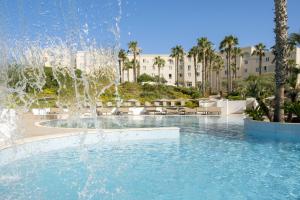 The swimming pool at or close to Mangia's Selinunte Resort
