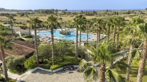 The swimming pool at or close to Mangia's Selinunte Resort