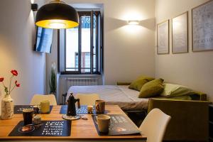 Ένα ή περισσότερα κρεβάτια σε δωμάτιο στο Appartamento elegante e moderno a 100 m dal Duomo