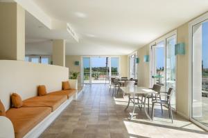 A seating area at Mangia's Selinunte Resort