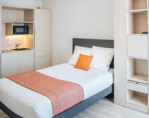 Posteľ alebo postele v izbe v ubytovaní Twenty Business Flats Lille - Bayard