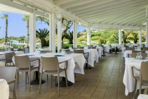 A restaurant or other place to eat at Mangia's Selinunte Resort
