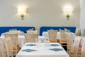 A restaurant or other place to eat at Mangia's Selinunte Resort