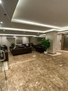 Posezení v ubytování Al tawfeeg hotel - Al Azizyah