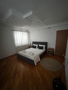 Postel nebo postele na pokoji v ubytování Apartman Marija