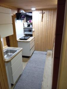 Η κουζίνα ή μικρή κουζίνα στο Góralska chałupa +10 φωτογραφίες