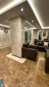 Posezení v ubytování Al tawfeeg hotel - Al Azizyah