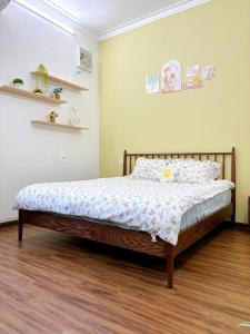 Ein Bett oder Betten in einem Zimmer der Unterkunft Mô Tê Homestay 2 gần Chợ Đông Ba, Cung Đình Hoàng Thành Huế