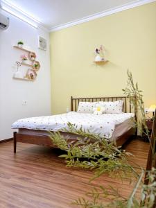 Ein Bett oder Betten in einem Zimmer der Unterkunft Mô Tê Homestay 2 gần Chợ Đông Ba, Cung Đình Hoàng Thành Huế