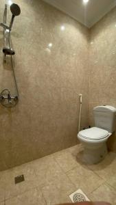 Koupelna v ubytování Al tawfeeg hotel - Al Azizyah