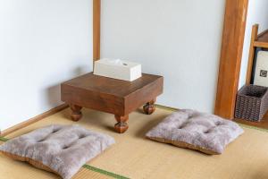 Postel nebo postele na pokoji v ubytování Suwa tiny house 一棟まるまる貸切 limited to 1group per day + 11 fotografií