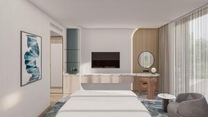 Ένα ή περισσότερα κρεβάτια σε δωμάτιο στο voco Beirut Central District by IHG